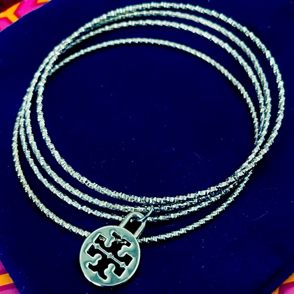 Gold Tory Burch bangle bracelets